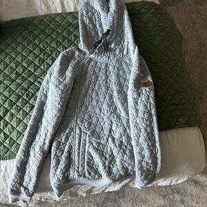 Roxy light grey "Aspen Snowmass" embroidered on the sleeve as pictured